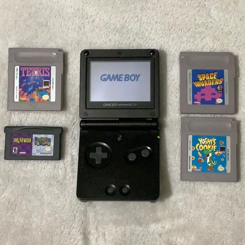 Nintendo Game Boy Advance SP With 4 Games